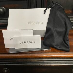 Versace sunglasses box with dust bag and polish cloth and care cards